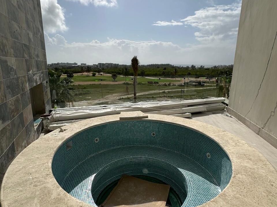 Luxury  Apartment with Ocean and Golf Course Views in Cap Cana's Las Iguanas Residential Complex