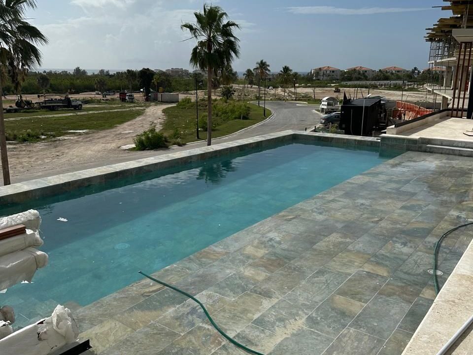 Luxury  Apartment with Ocean and Golf Course Views in Cap Cana's Las Iguanas Residential Complex